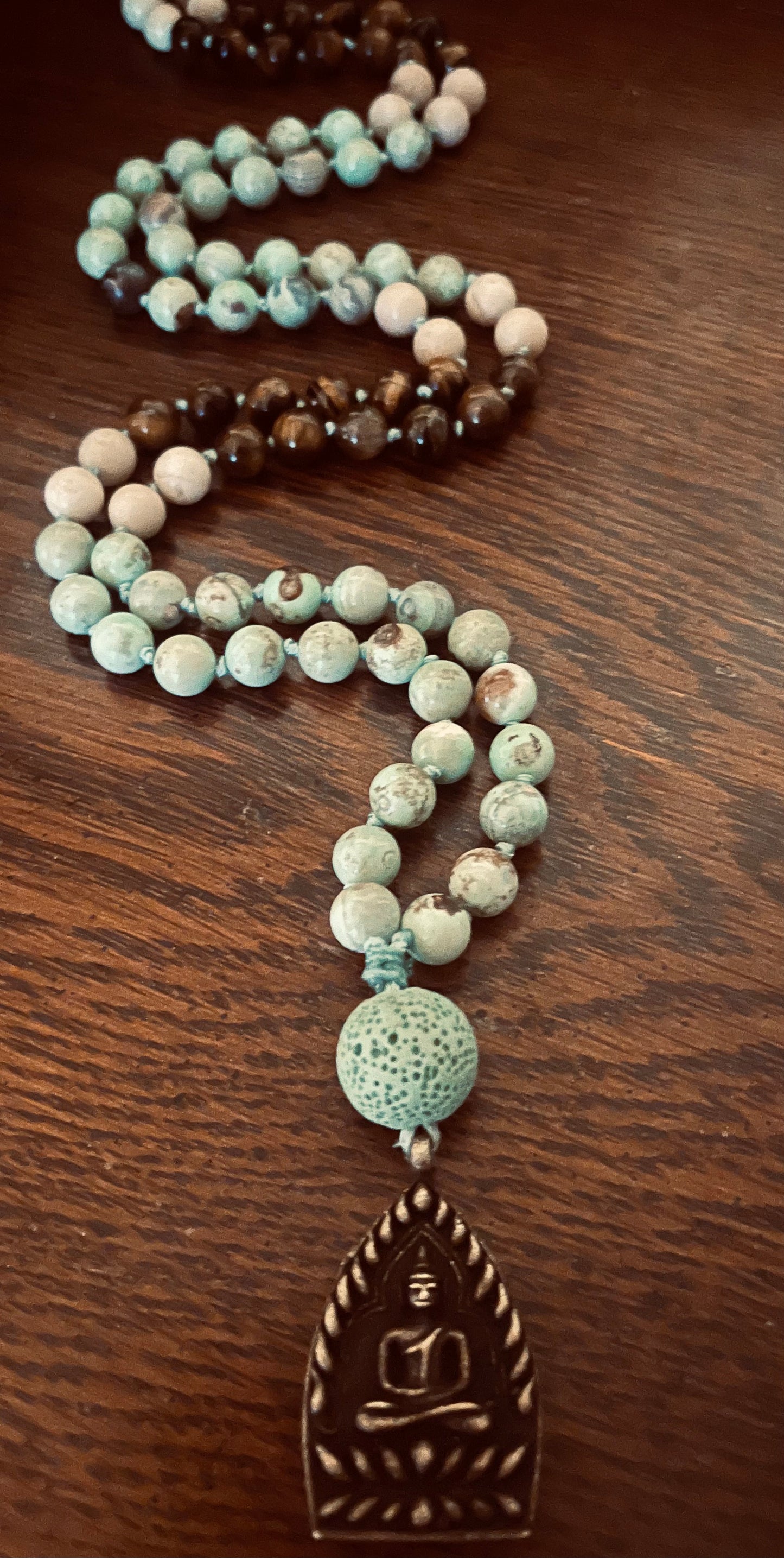 Tranquil Transformation Mala, Turquoise dyed Fire Agate, Riverstone, Tiger’s Eye